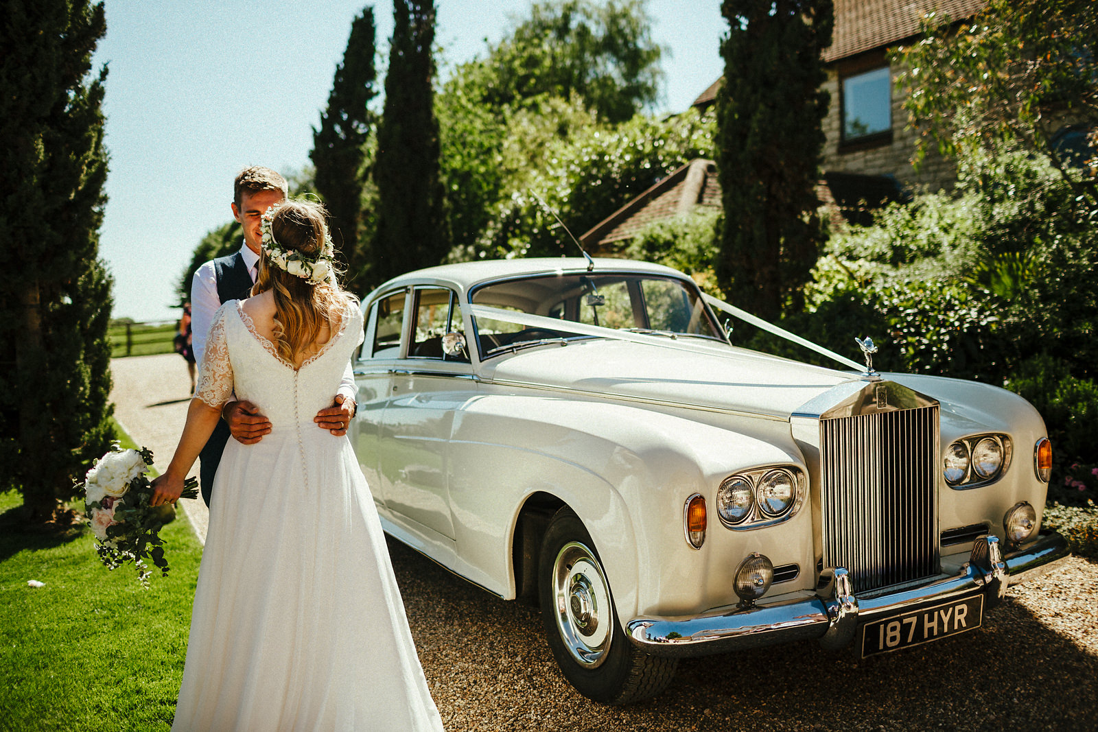 White rolls royce wedding car photo