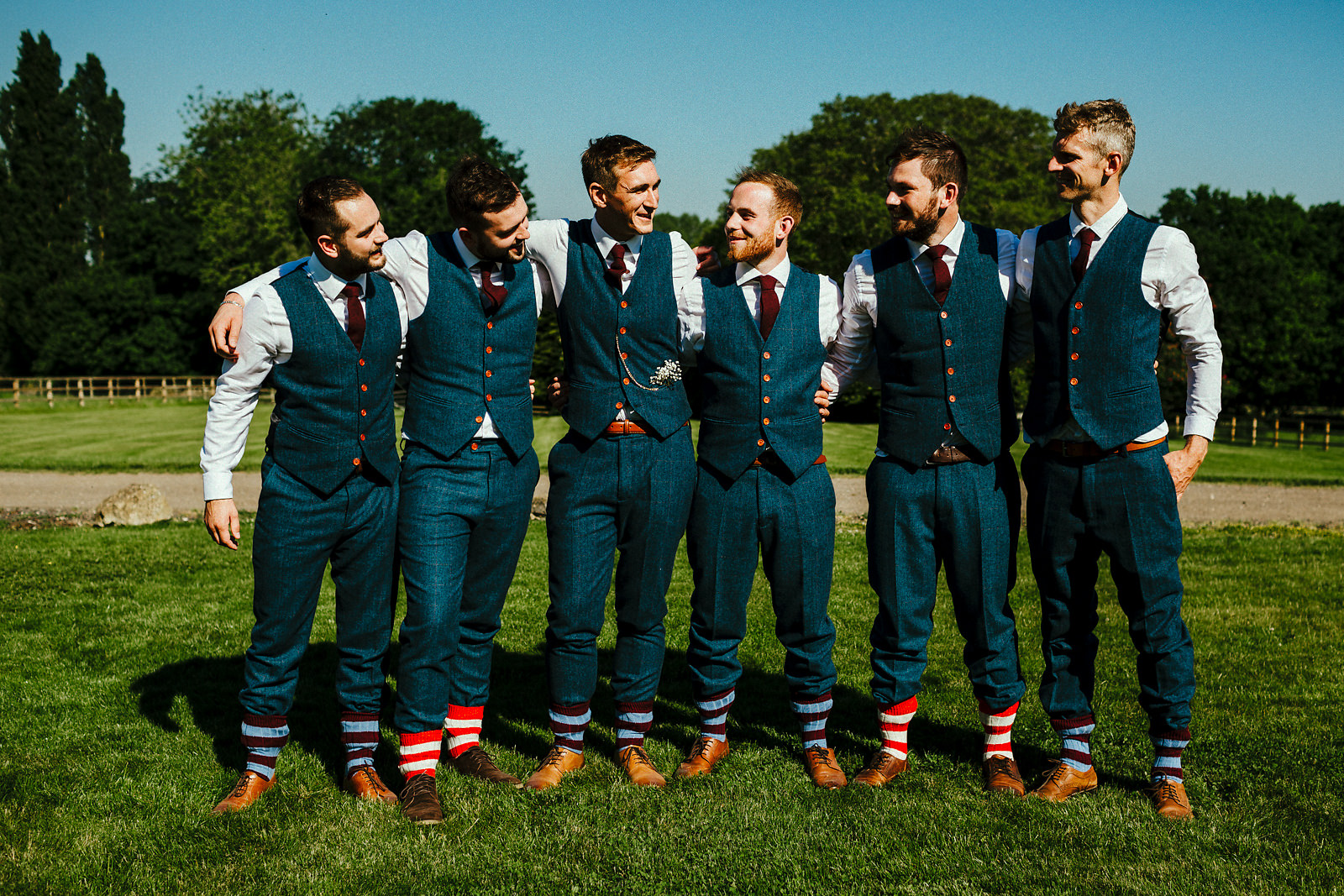 Groomsmen rocking football socks