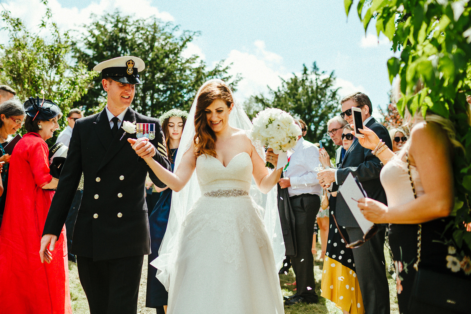 Bride and groom wedding ceremony exit photo