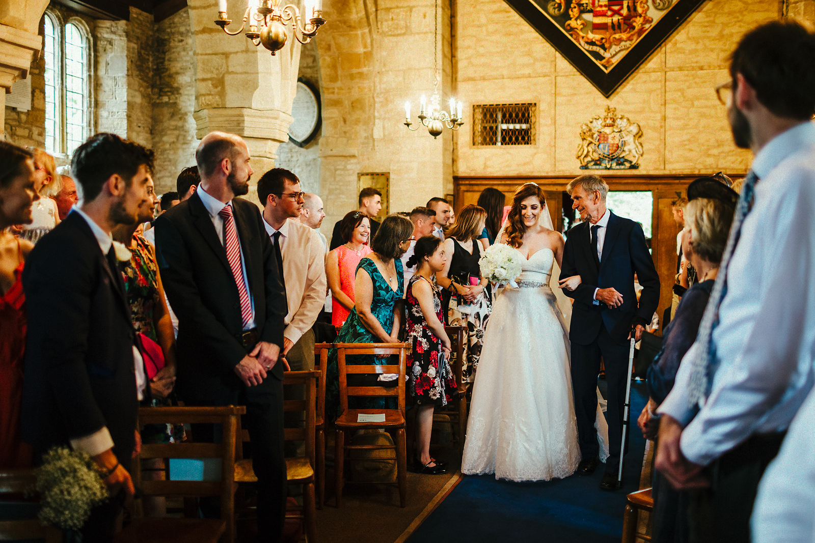 Bride enters St Mary's church at Courteenhall