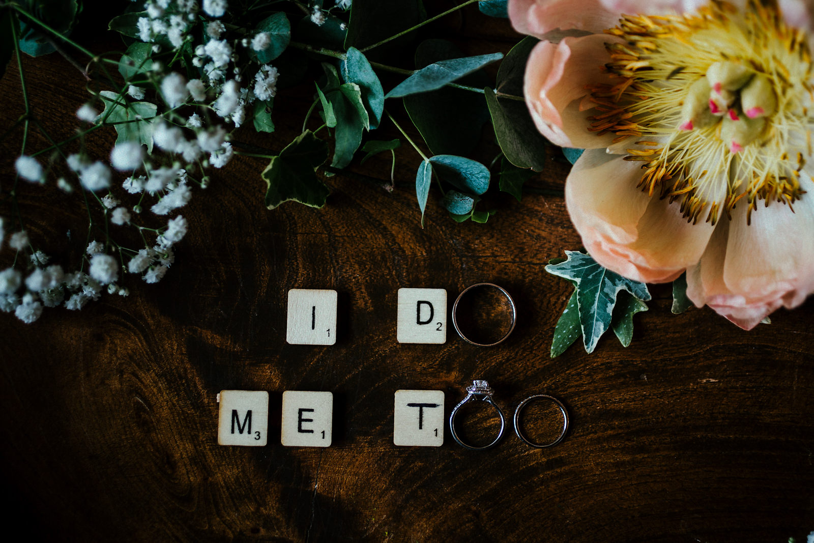 Wedding ring photo with scrabble pieces