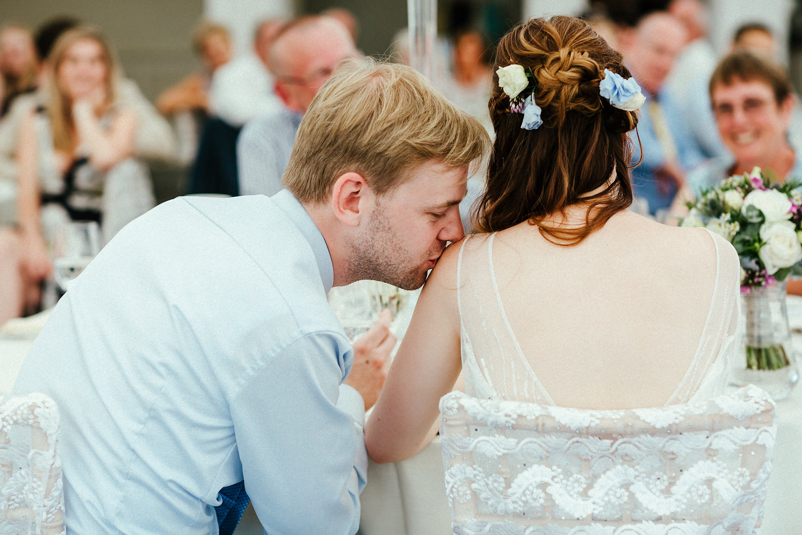 Happy groom kissing the bride