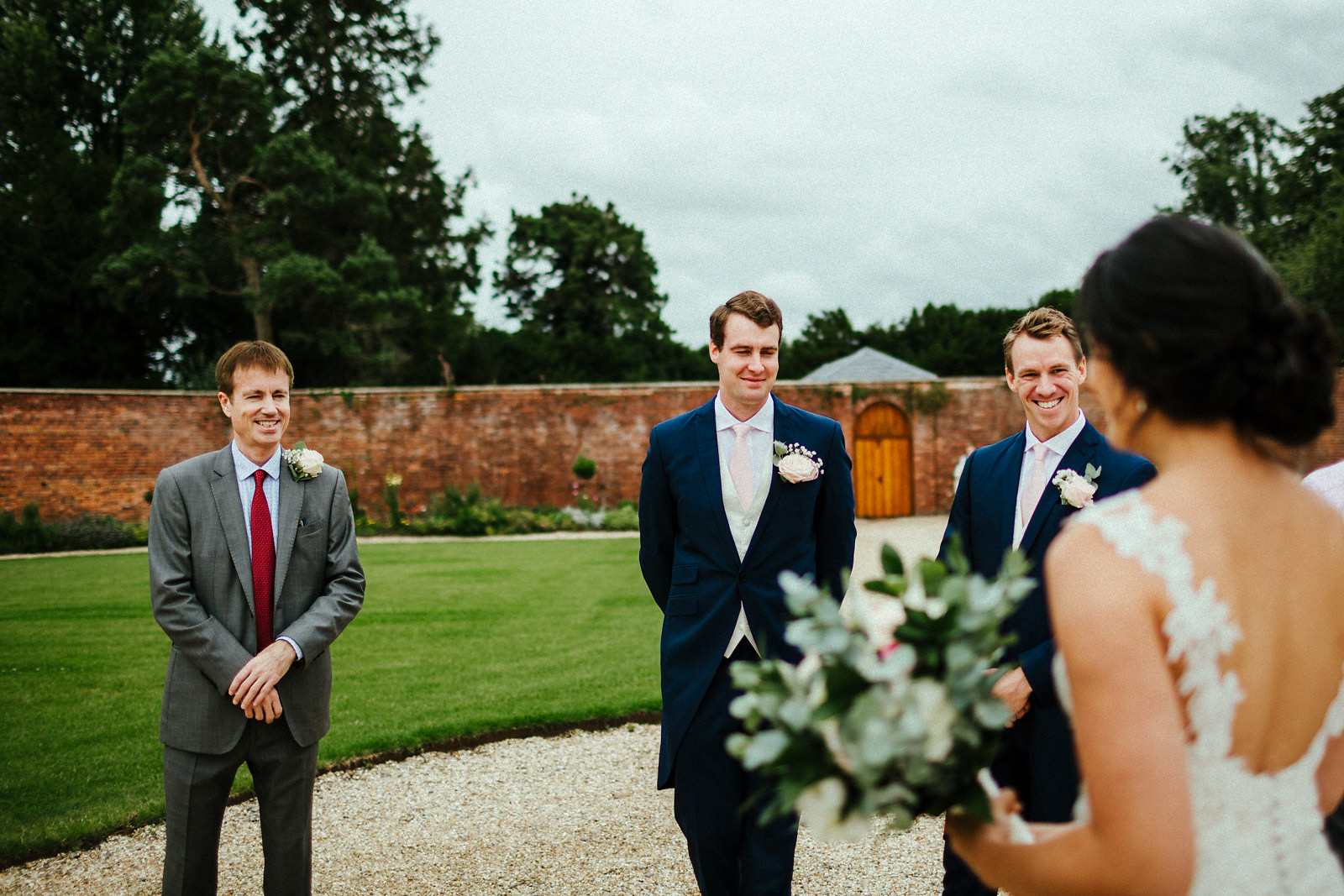 Bride meeting dad at Orchardleigh walled garden