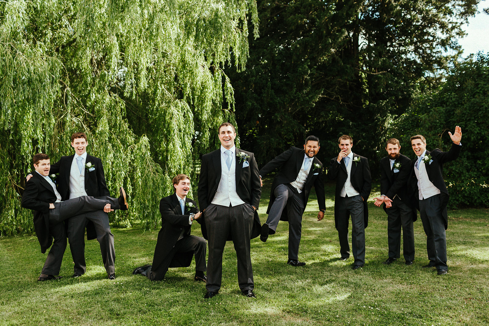 Groomsmen having fun with the groom