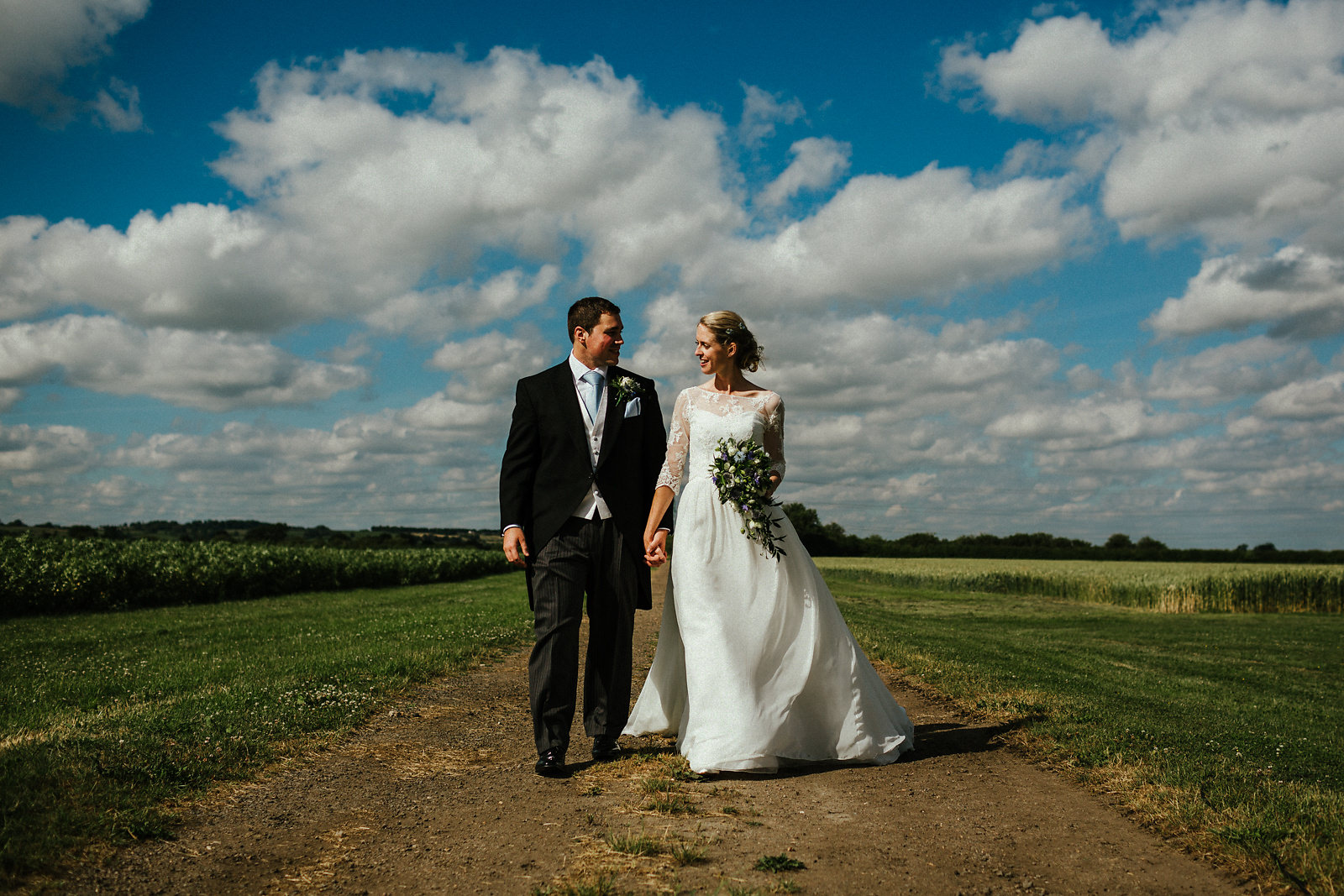 Bride and groom walking natural photo idea