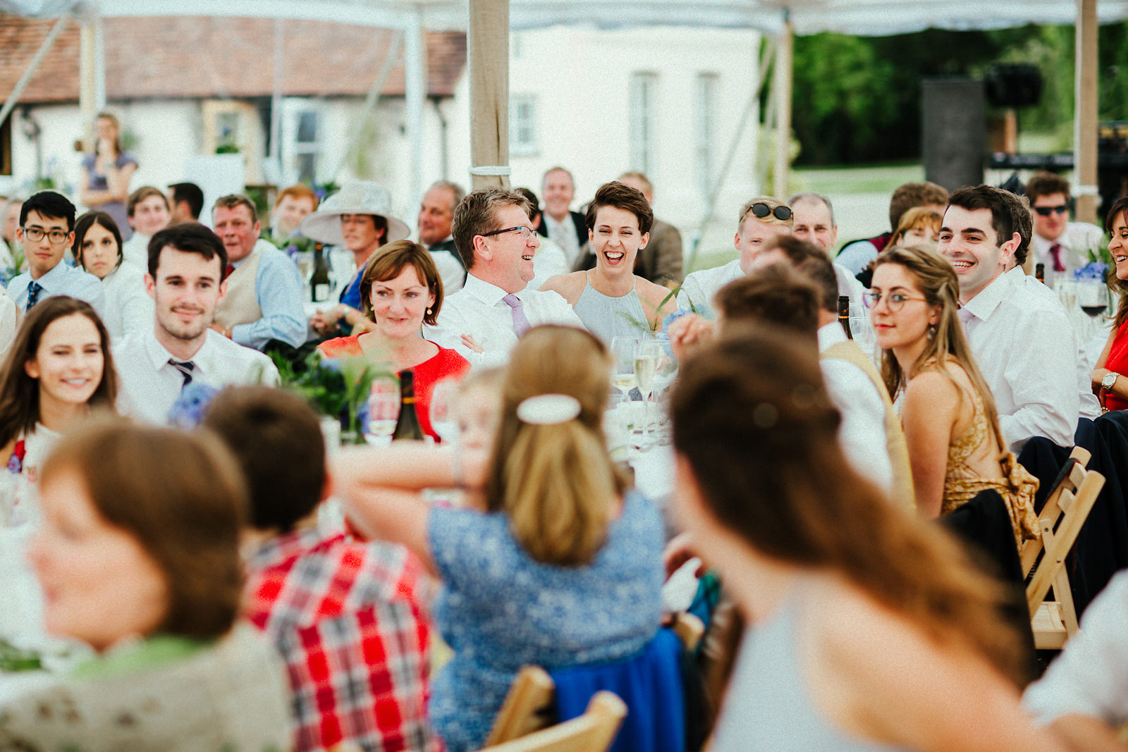 Wedding guests on long tables