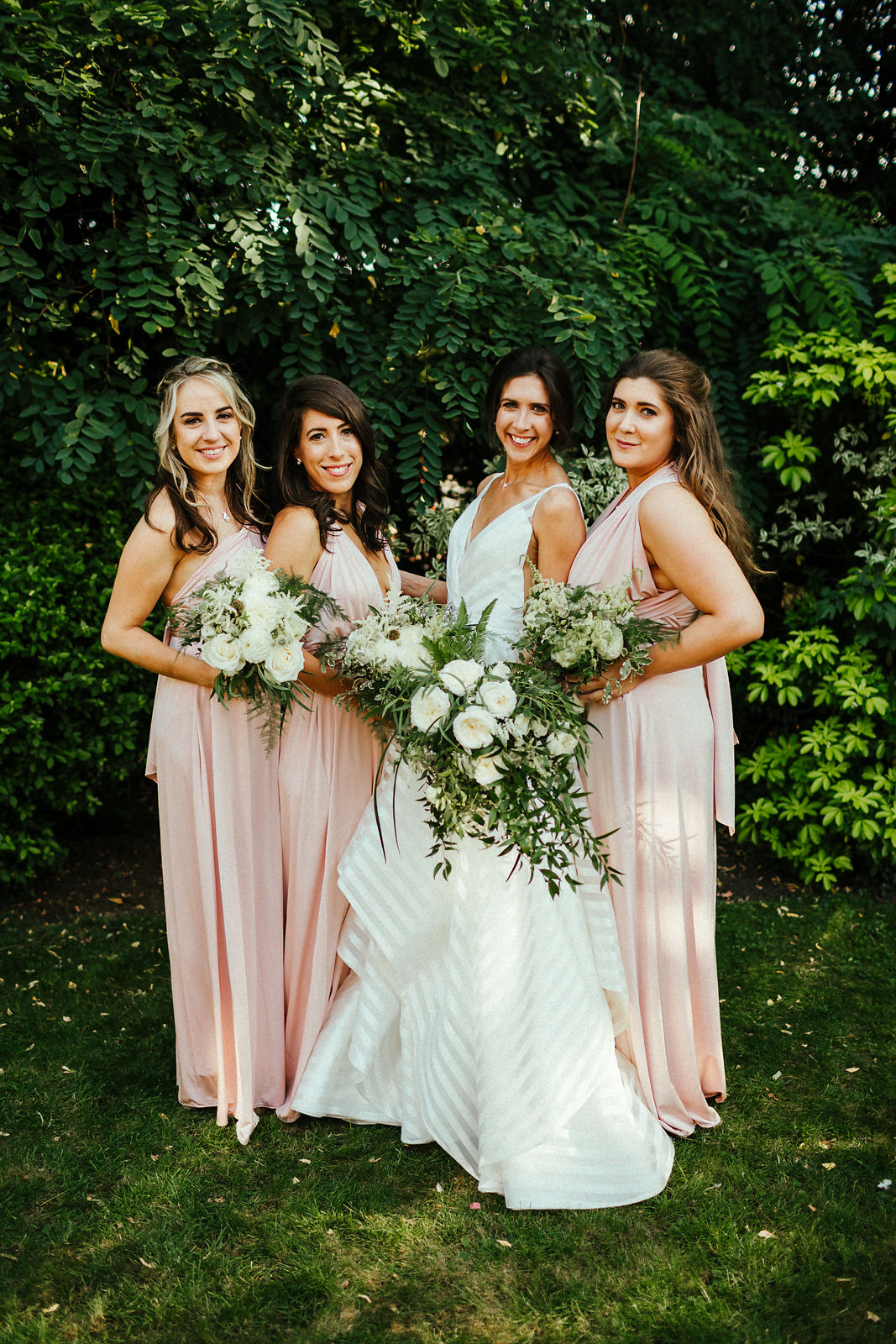 Stunning bridesmaids in pink dresses