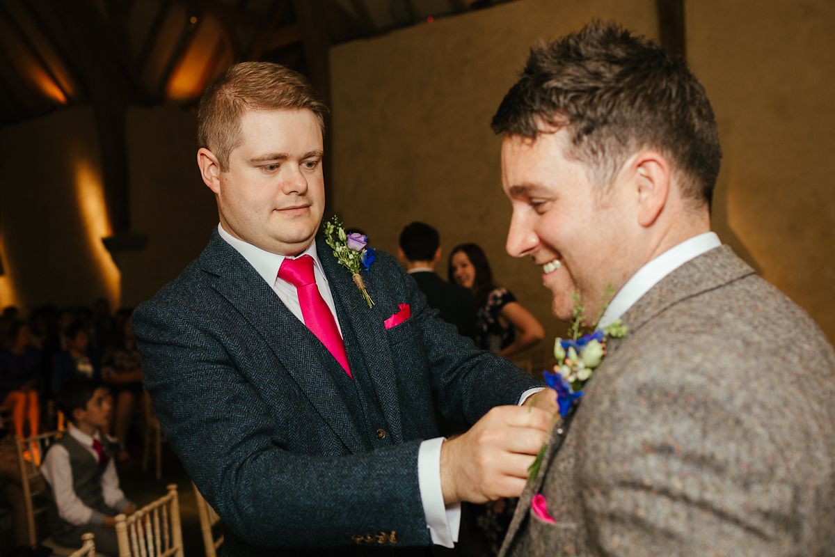 Indoor wedding ceremony in the Great Barn in Devon