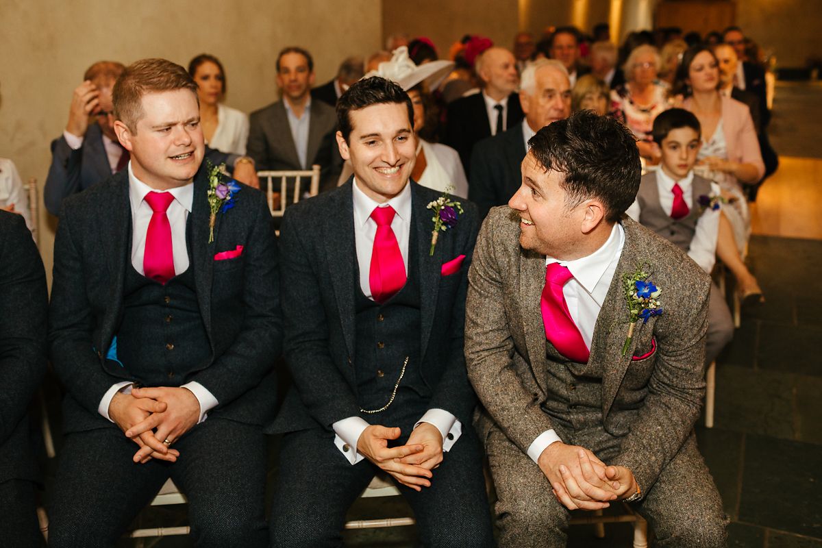 Indoor wedding ceremony in the Great Barn in Devon