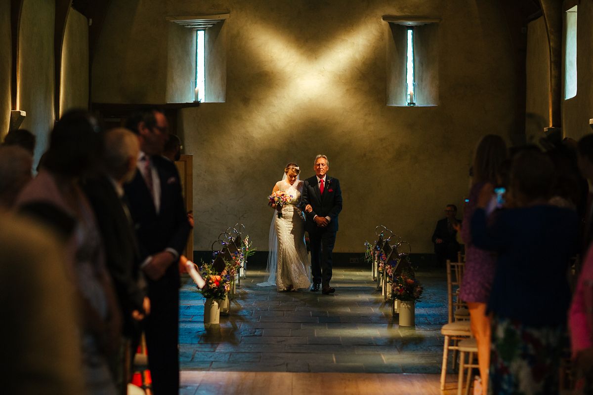 Indoor wedding ceremony in the Great Barn