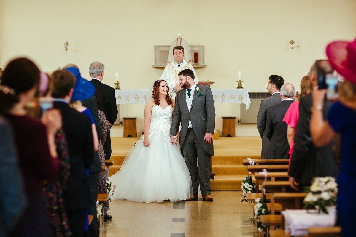 Catholic Church wedding ceremony photographer