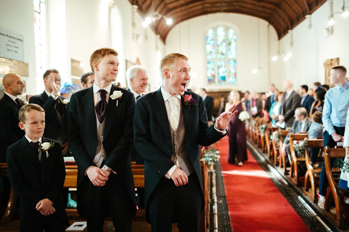 Groom wedding photography at Latimer Estate church