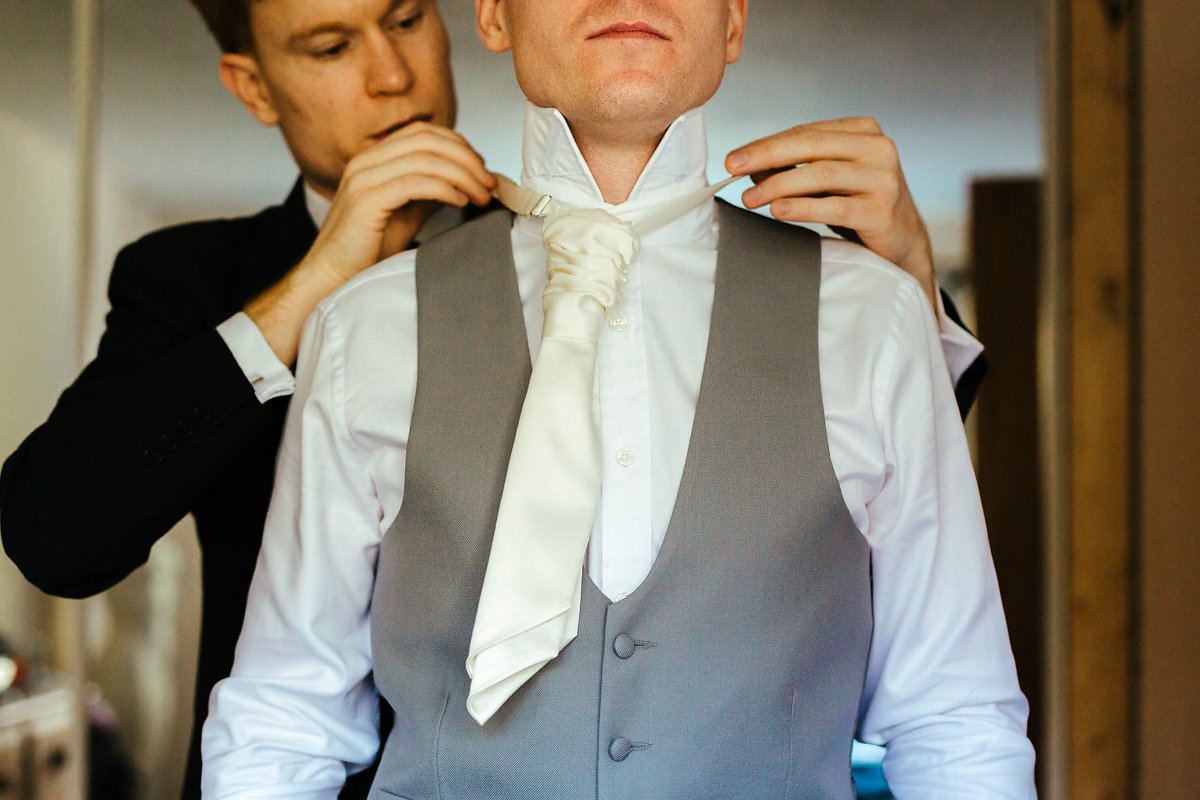 Groom getting ready for a ceremony