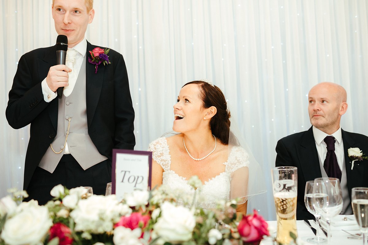 Surprised bride during speeches at Latimer House