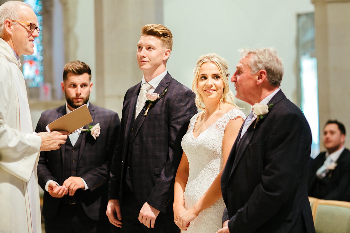 Dad giving the bride to the groom