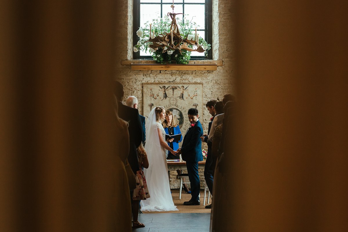 Wedding ceremony at the Stone Barn back view