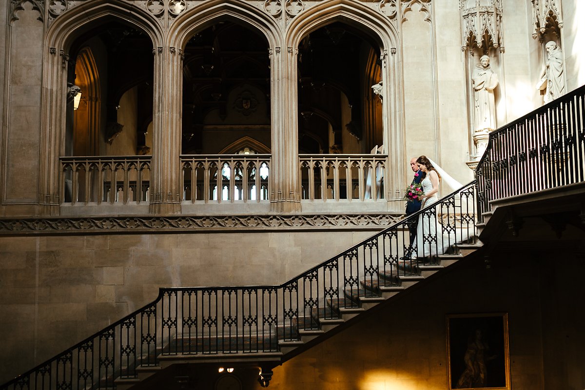 Arrival of bride through Ashridge grand stairs