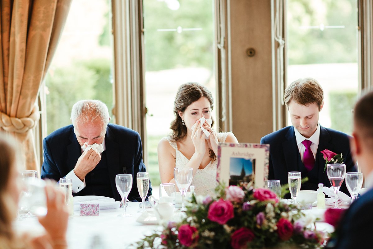 Bride and dad in tears during speeches photo