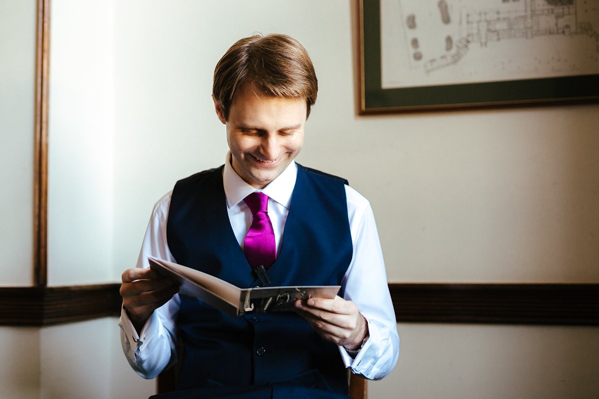 Groom receiving a letter from the bride