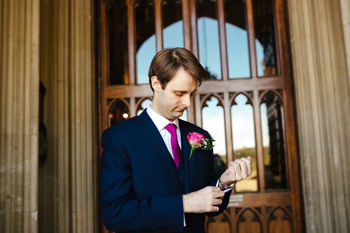 Groom in front of the Ashridge House