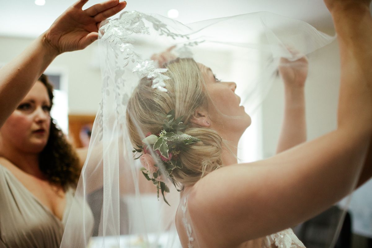 Bride getting dressed at Kings Chapel