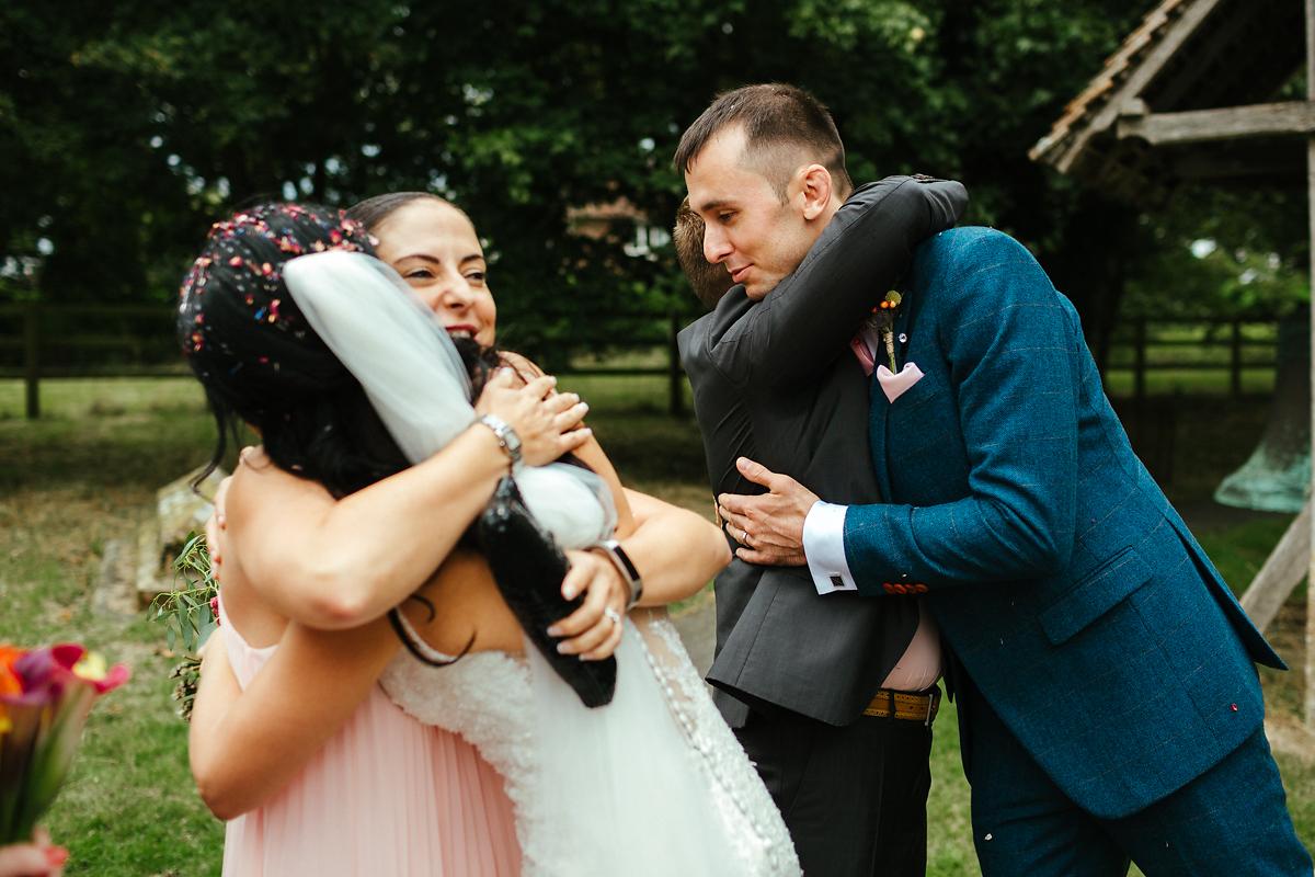 Newly married couple exit at St Peter and St Paul church in Bislington Kent