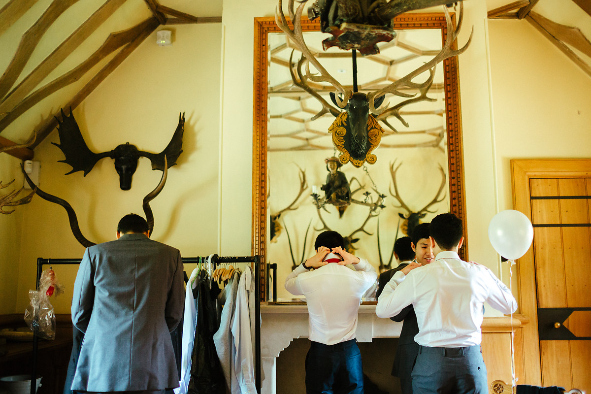 Groomsmen getting ready at the Dairy stag room