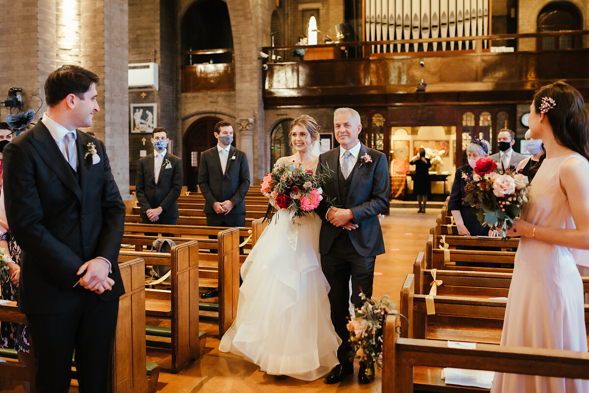 Father walking down the bride in London church